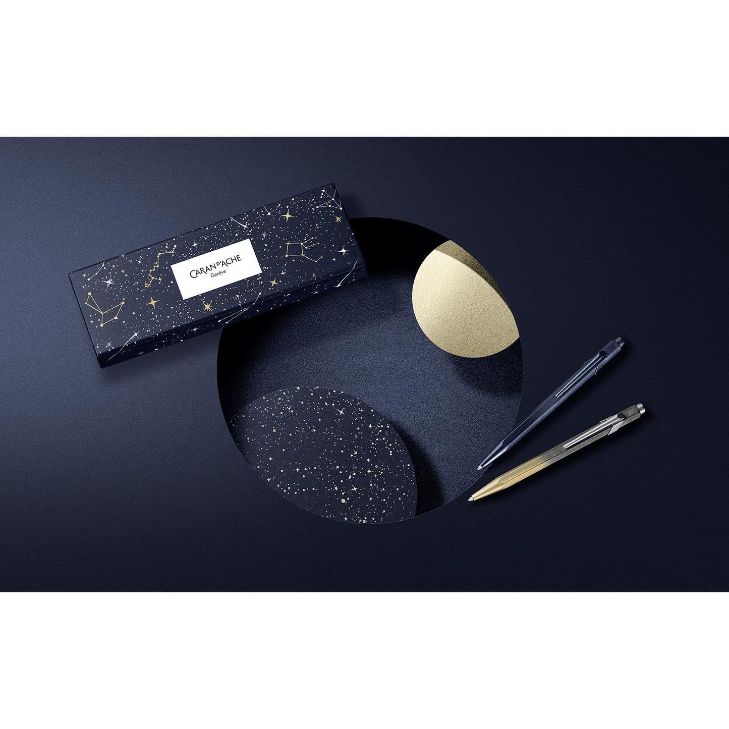 Caran d'Ache 849 Ballpoint Pen - Cosmic Gold Gilded - Special Edition Cosmic Blue lifestyle 2