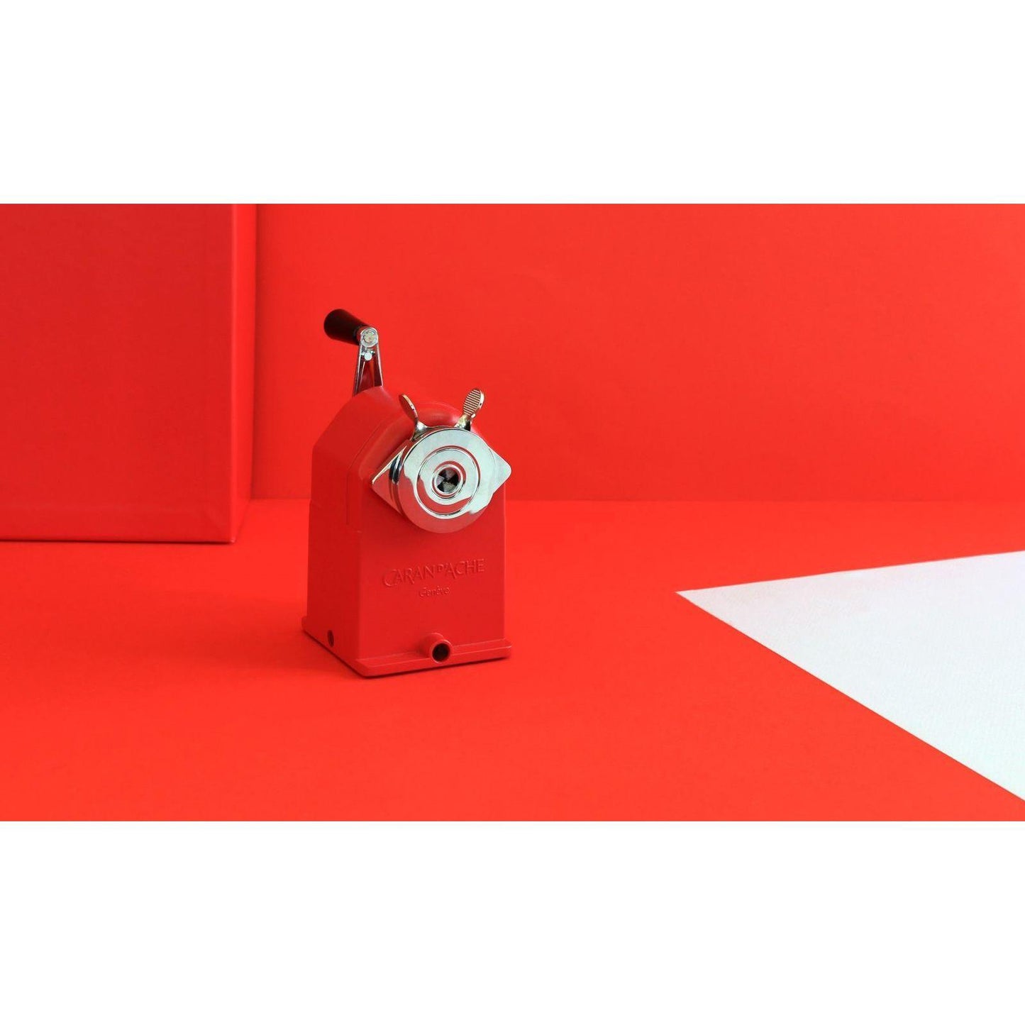 Caran d'Ache Pencil Sharpener - Sharpening Machine Red on table