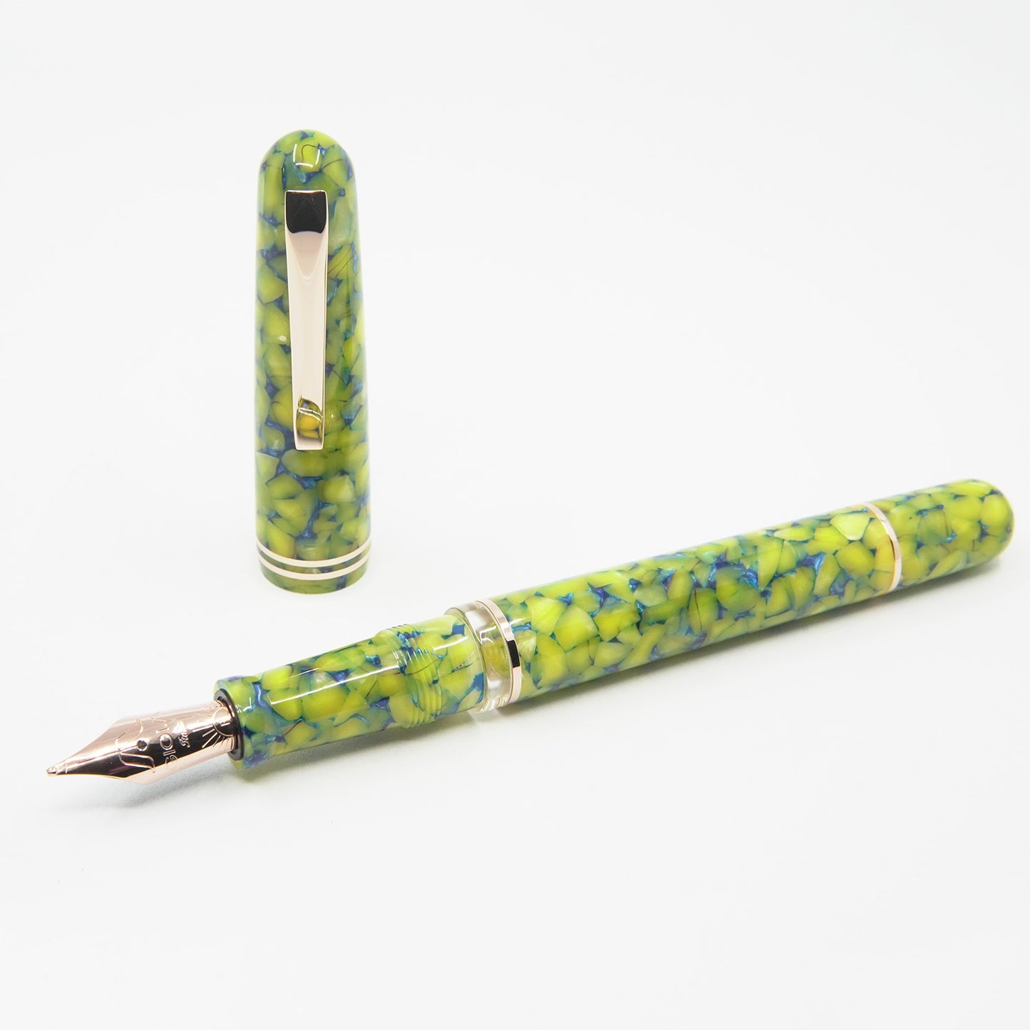 Gioia Metis Fountain Pen - Giallo Colibri - Rose Gold Trim uncapped on table