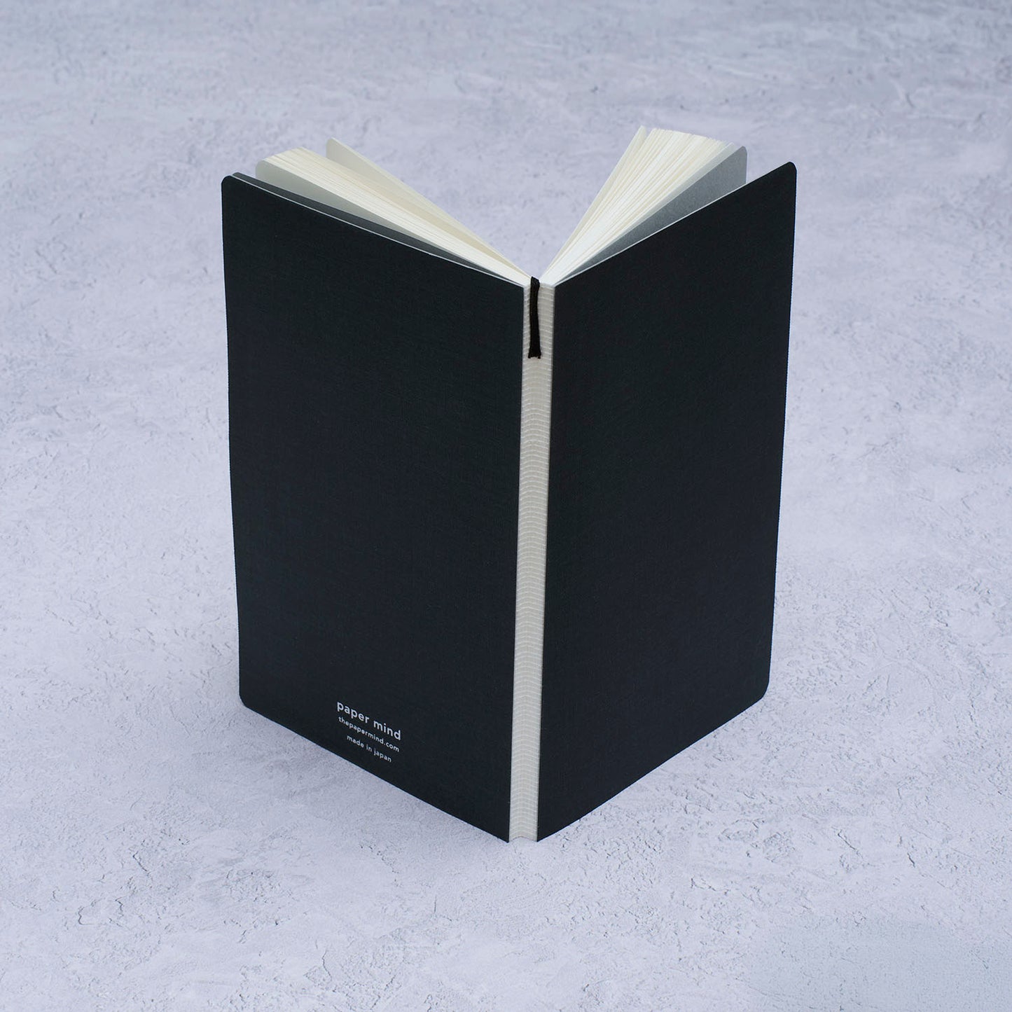 The Paper Mind Meringue Paper Notebook B6 Slim,  Notebook for Fountain Pens, dot grid, black cover spine