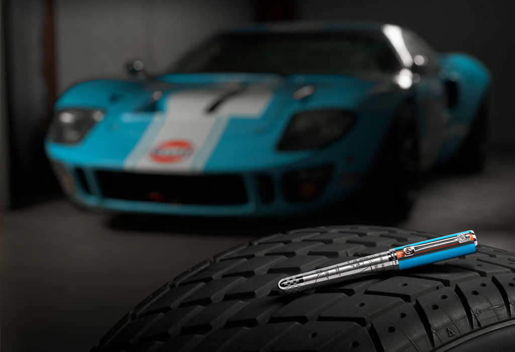 Montegrappa 24H Le Mans Legende Ballpoint on tire with ford gt40