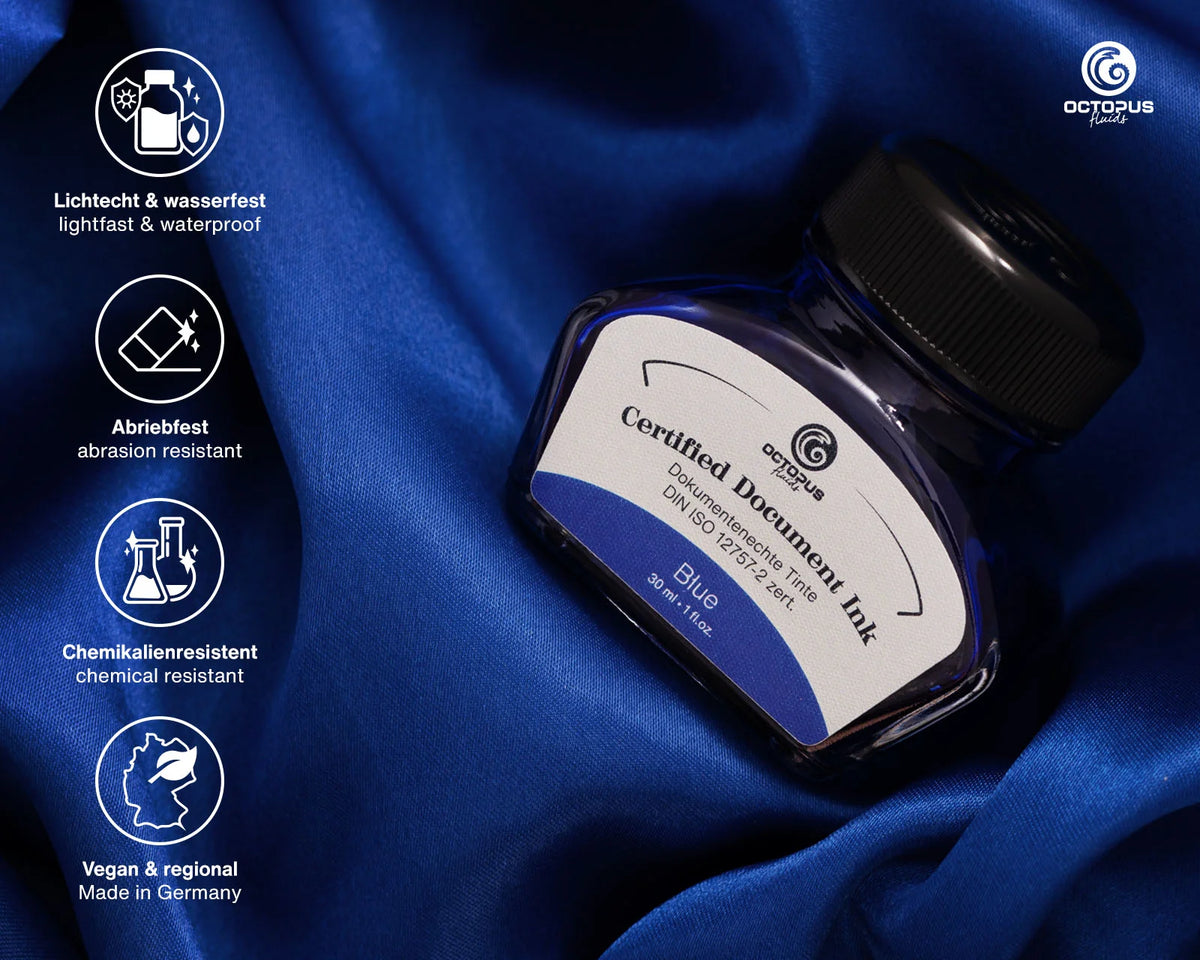 Blue ink bottle on a blue fabric background with Octopus Ink branding and product features. Octopus Fluids Fountain Pen Document Ink - 30 ml Bottle - Dark Blue -  Made in Germany
