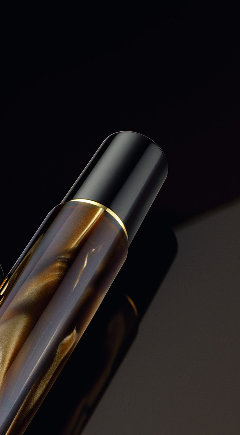 Pelikan Classic M200 Fountain Pen - Brown Marble - Made In Germany lifestyle barrel detail. 
