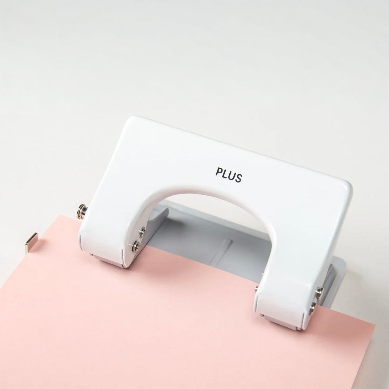 Postalco Snap Pad PLUS 2 hole punch in action