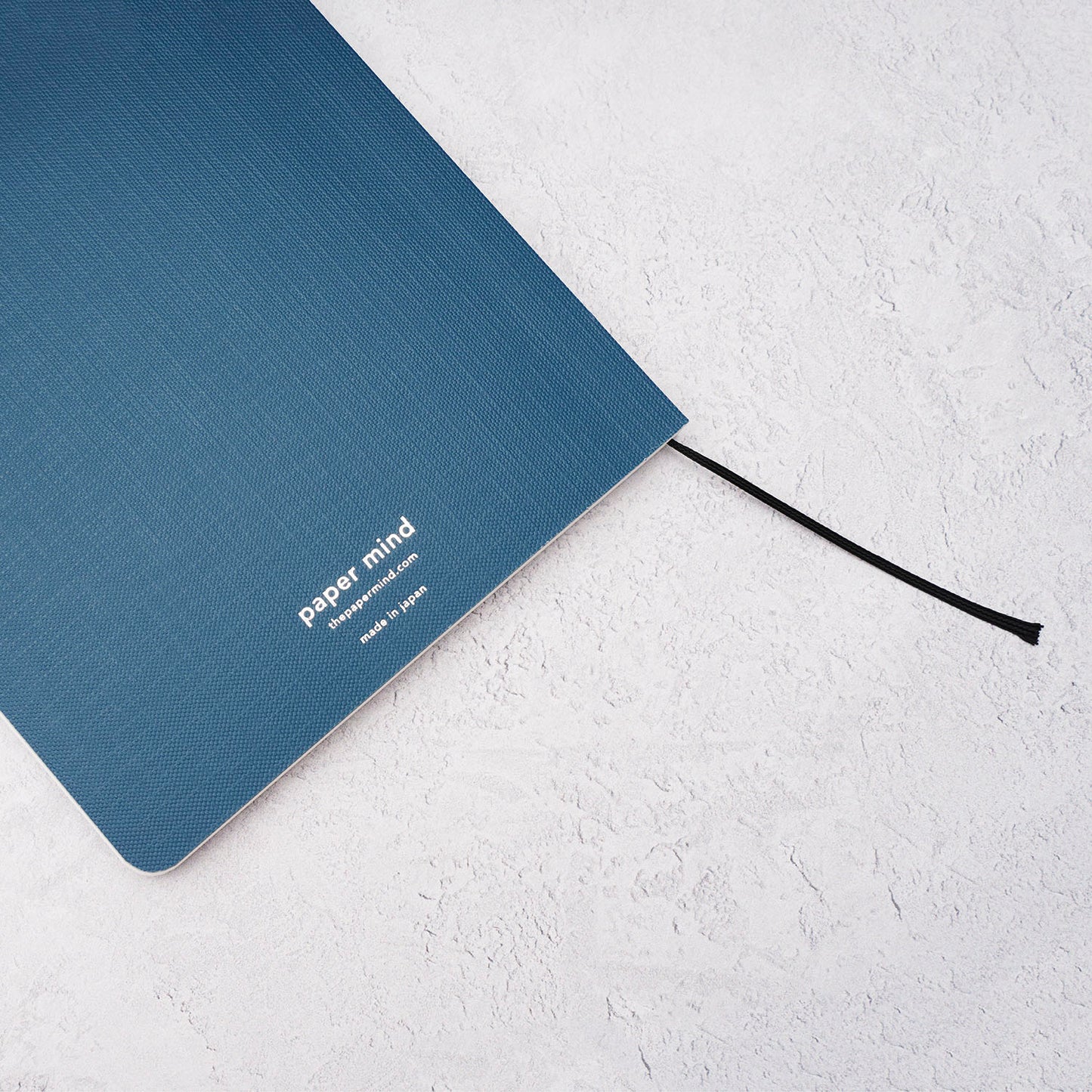 The Paper Mind B7 Tranext Paper Notebook A5 Front Ruled Blue back angle