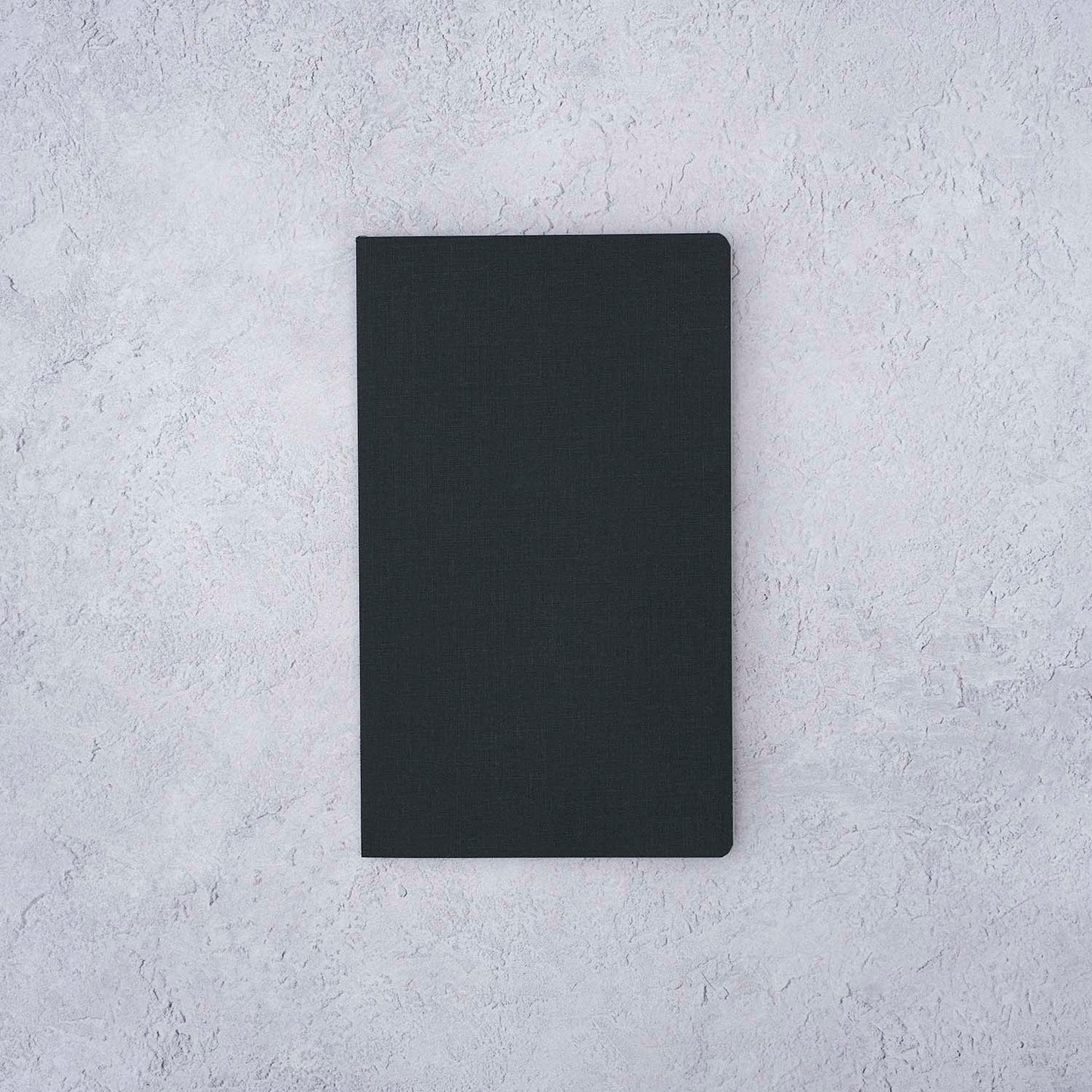 The Paper Mind Meringue Paper Notebook B6 Slim,  Notebook for Fountain Pens, dot grid, black cover front