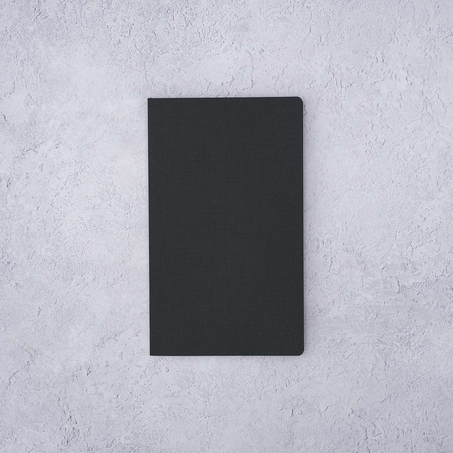 The Paper Mind Meringue Paper Notebook B6 Slim,  Notebook for Fountain Pens, dot grid, black cover front