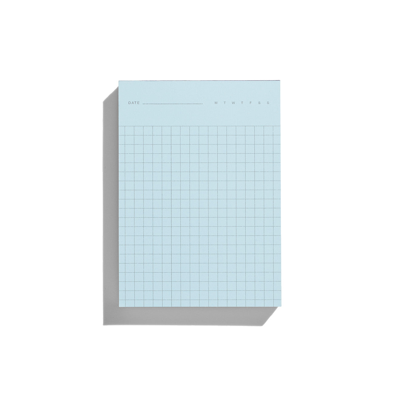Grid sheet of 2-in-1 Notepad in Blue and Green by Before Breakfast. Grid and ruled sheets. Made in England and fountain pen friendly.